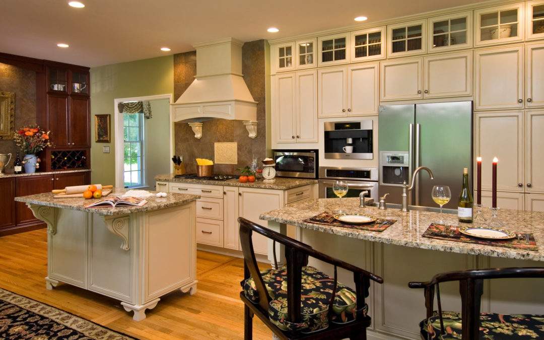 creamy kitchen with two islands